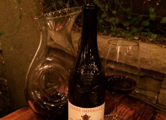 wine bottle with decanter and glass of red wine